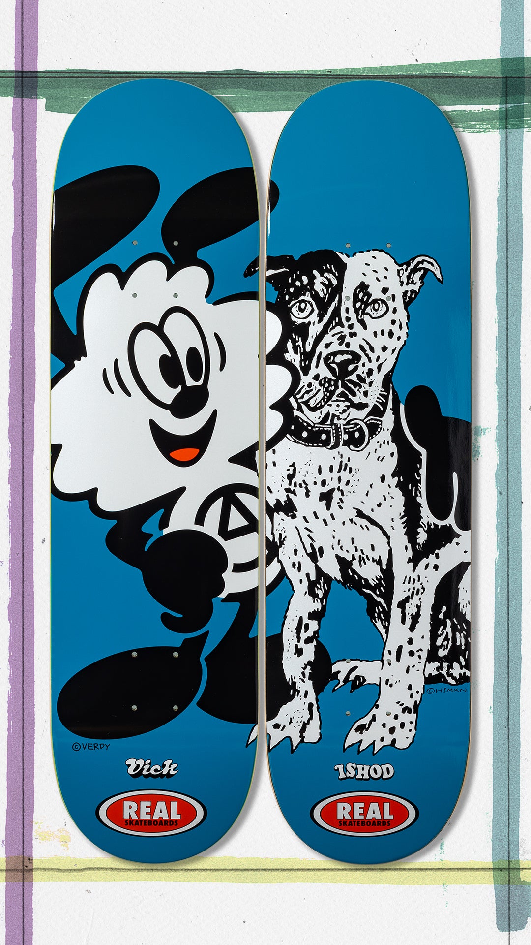 Two skateboard decks with cartoon character designs on a blue background.