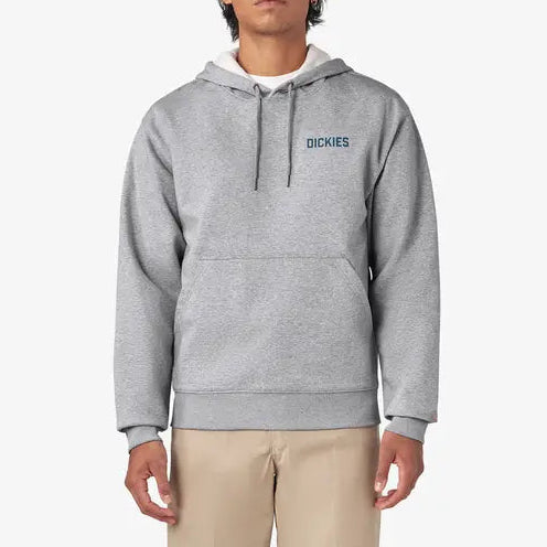 Person wearing a gray hoodie with 'Dickies' logo on a white background