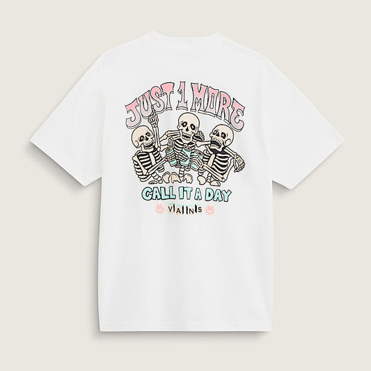 A white short-sleeve t-shirt with a colorful graphic on the back featuring three skeletons and the text 'JUST A HIDE CALL IT A DAY' and 'visits', displayed on a light beige background.