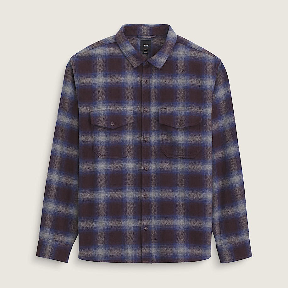 Plaid shirt with a pattern of blue and purple on a light gray background