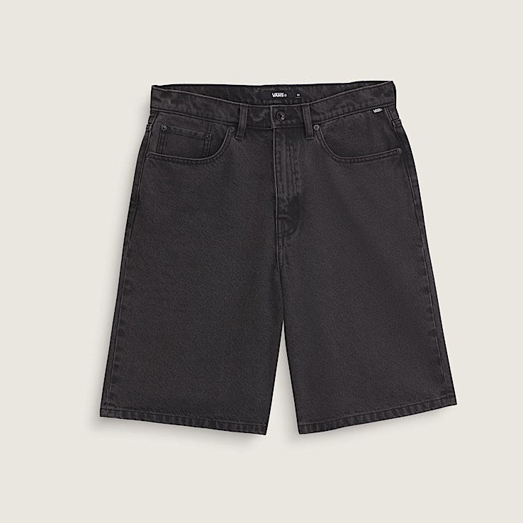 Black denim shorts on a light beige background