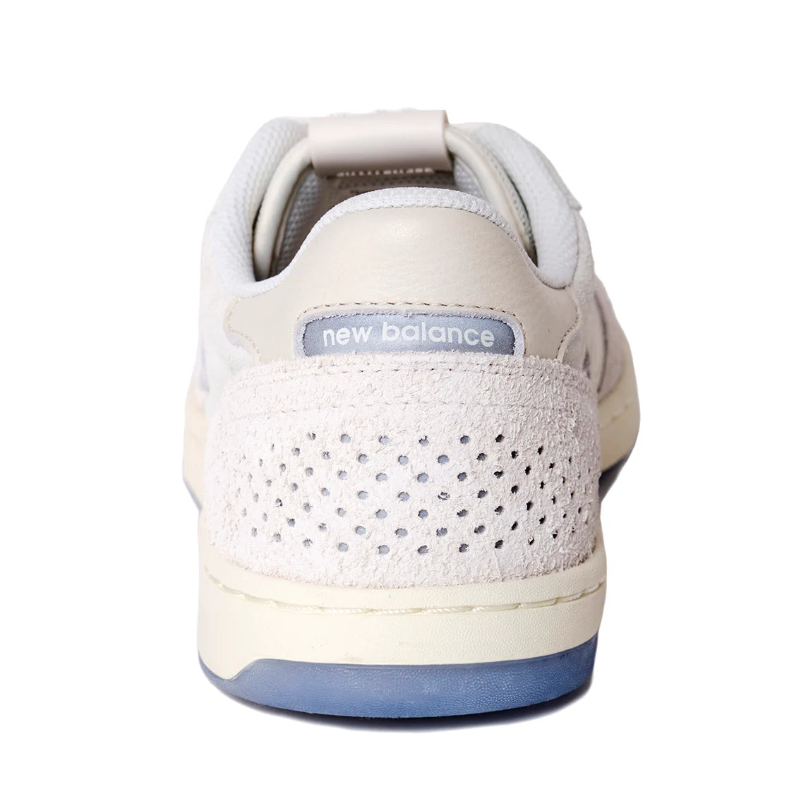 White sneaker with New Balance logo on a white background