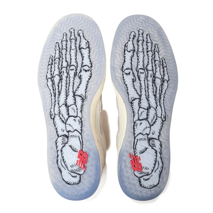 Insole with foot skeleton illustration and New Balance logo on a white background