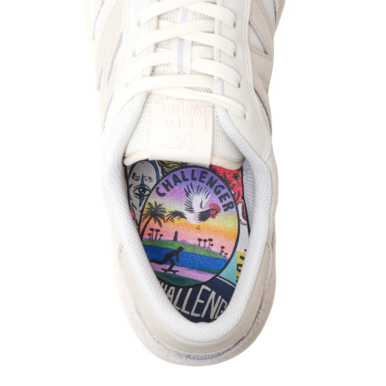 White sneaker with colorful 'Challenger' logo on a white background