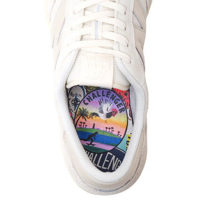 White sneaker with colorful 'Challenger' logo on a white background
