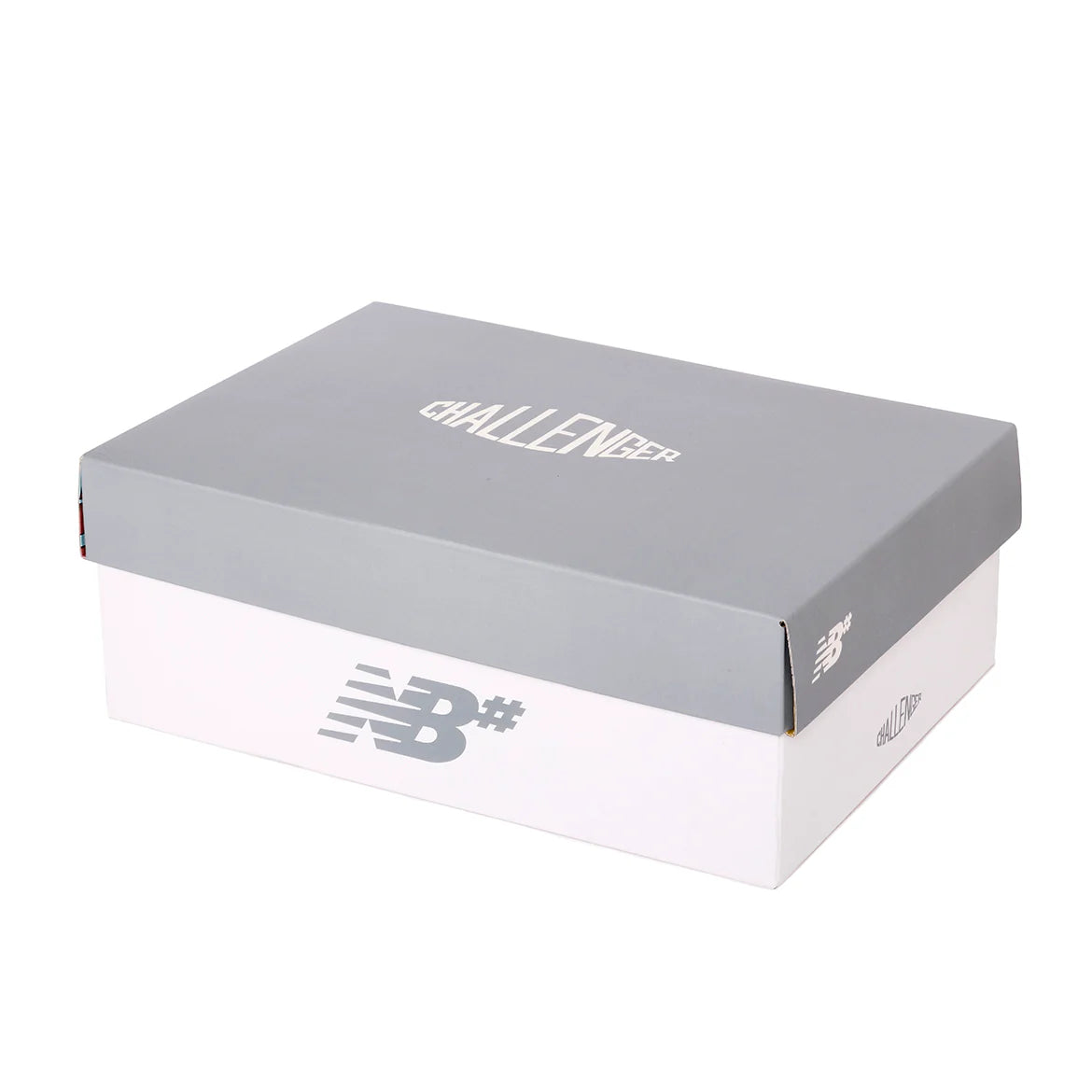 Gray and white shoe box with 'Challenger' text and New Balance logo on a white background