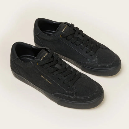 Pair of black sneakers on a white background