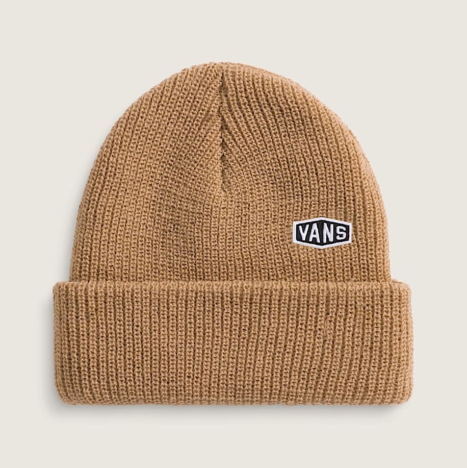 Brown knit beanie with Vans logo on a beige background