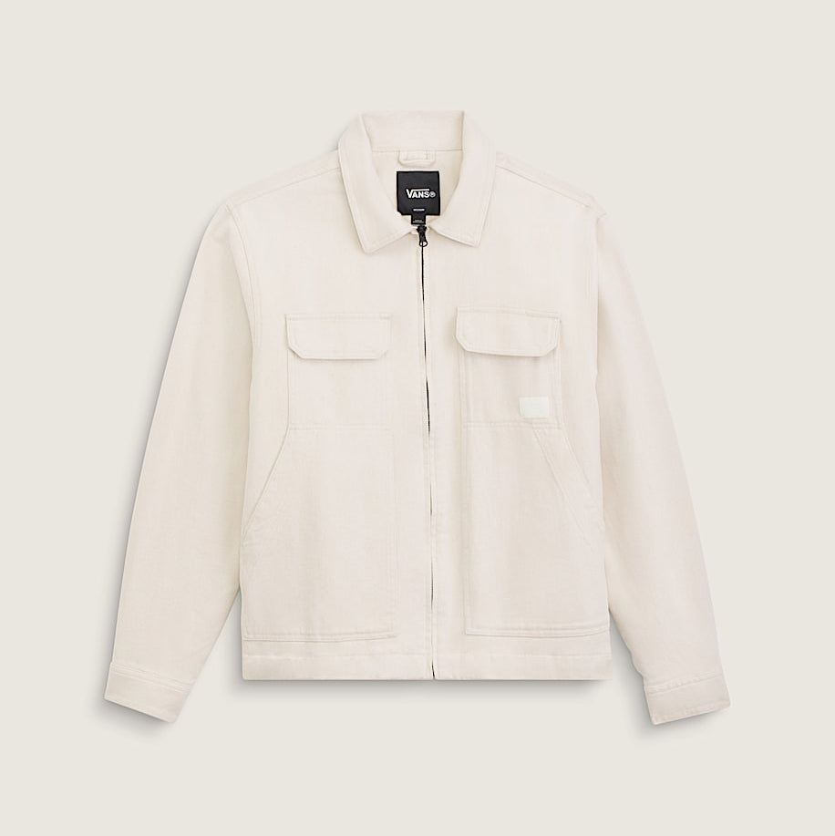 An off-white canvas utility jacket with a front zipper, two chest flap pockets, and a small white brand patch on the left chest, displayed on a light beige background.