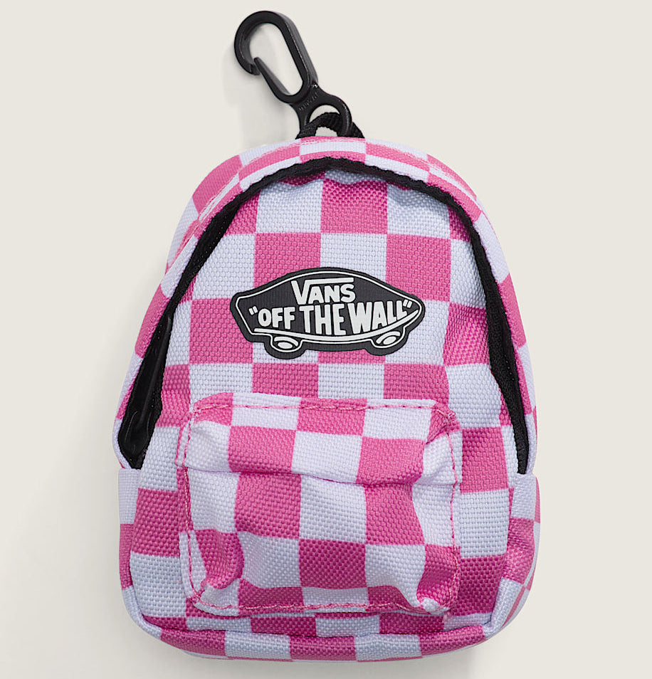Pink and white checkered keychain pouch with Vans 'Off The Wall' logo on a light beige background