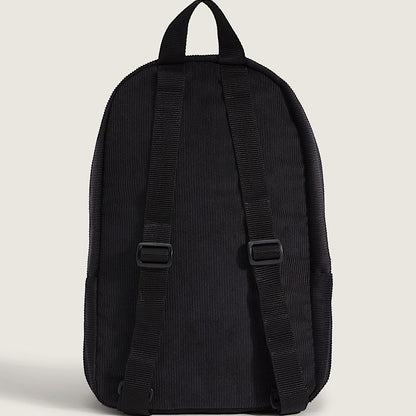 Black backpack on a light beige background