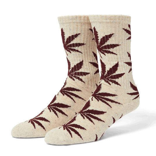 Beige socks with red leaf pattern on a transparent background