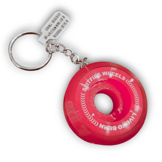 Red donut-shaped keychain with 'Spitfire Wheels' branding on a white background