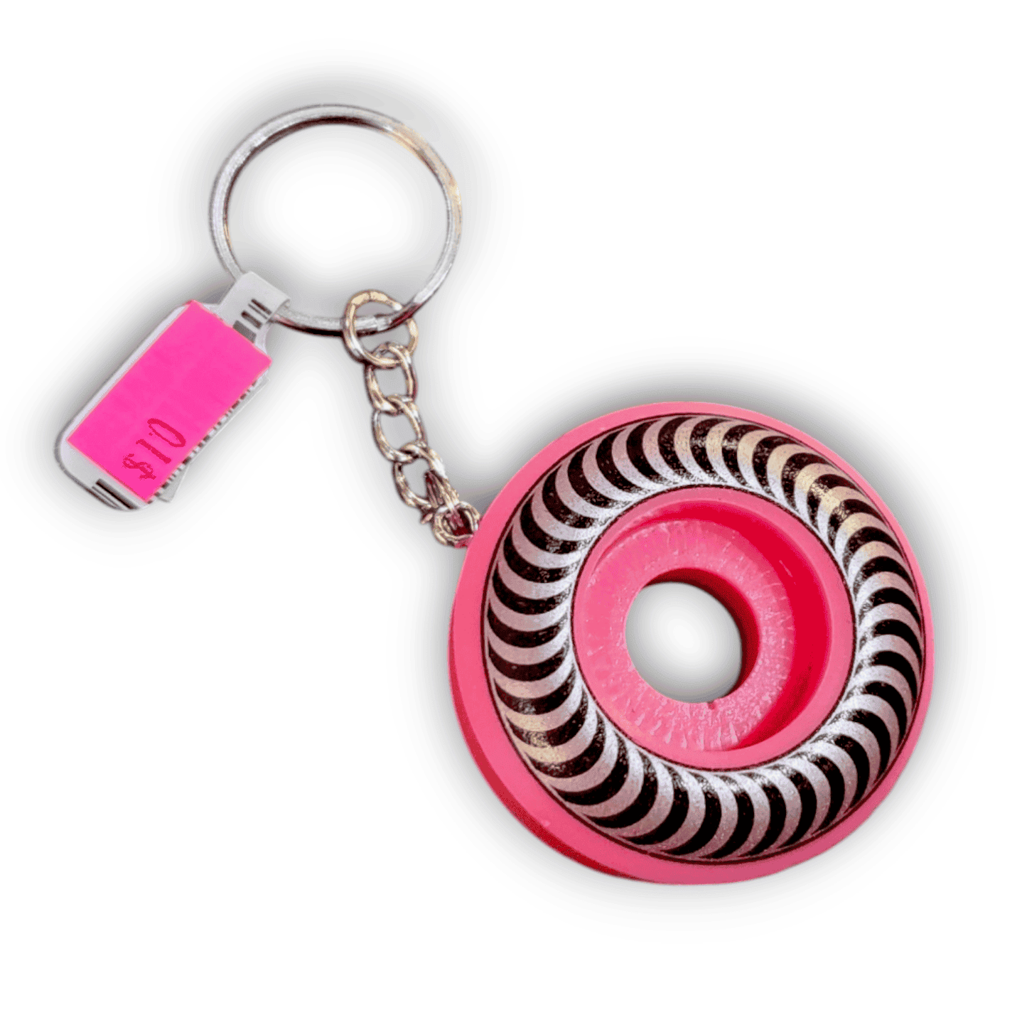 Keychain with pink and swirl patterned design on a white background