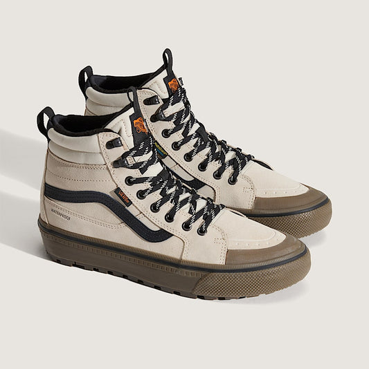 Pair of high-top sneakers with black laces on a light gray background