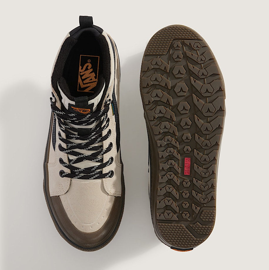 Vans sneaker with top and sole view on a light gray background