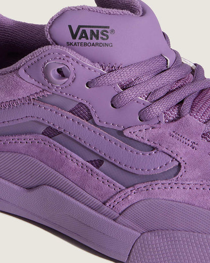 Purple Vans skateboarding shoe on a light background