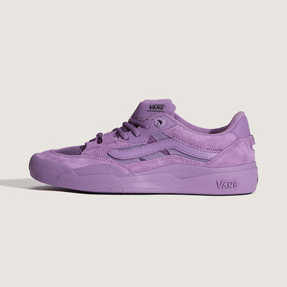 Purple Vans sneaker on a light gray background