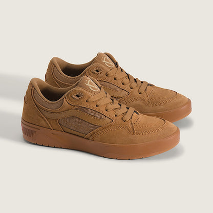 Pair of brown sneakers on a light gray background