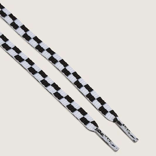Black and white checkered shoelaces on a light gray background