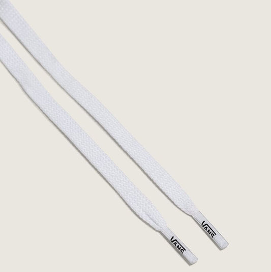 White shoelaces with Vans logo on a light beige background