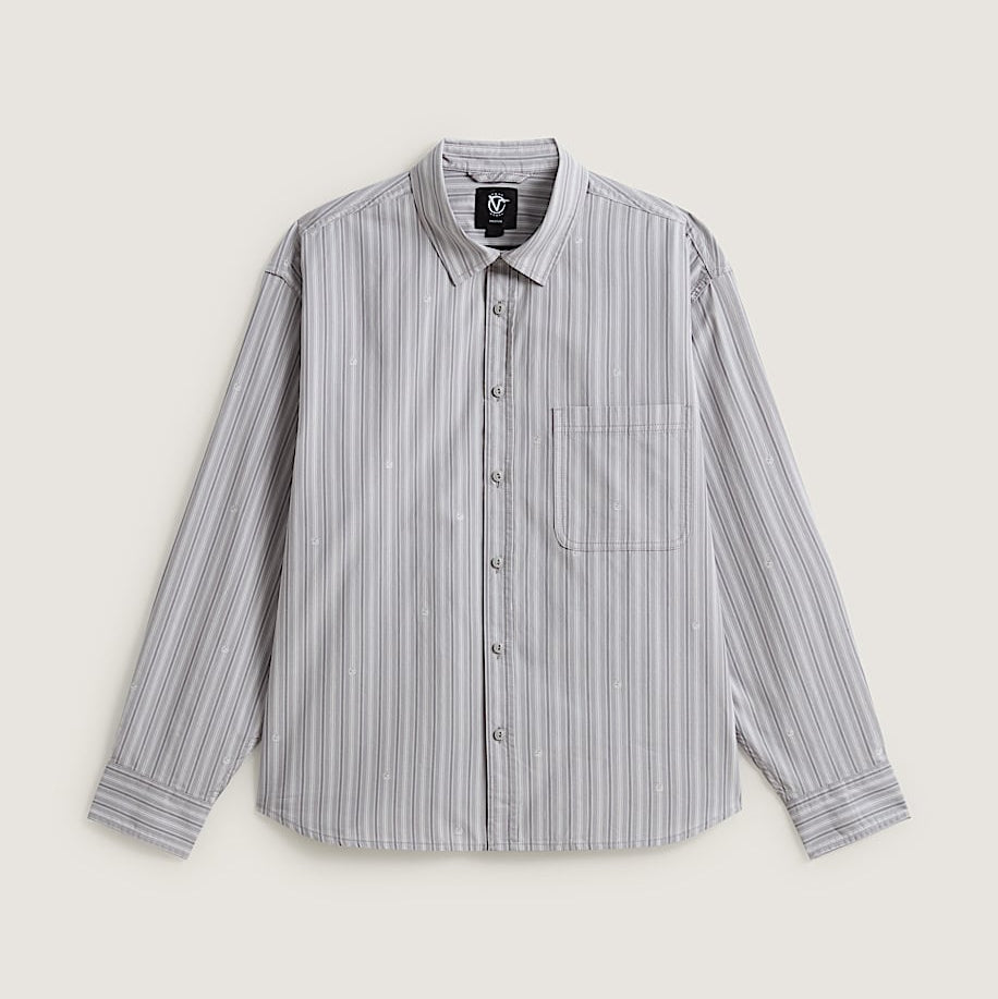 A long-sleeve button-up shirt with vertical gray and white stripes, featuring a classic collar, button front, and a chest pocket, displayed on a light beige background.