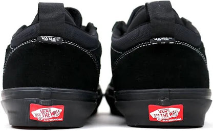 Black Vans shoes with red 'Off The Wall' logo on a white background