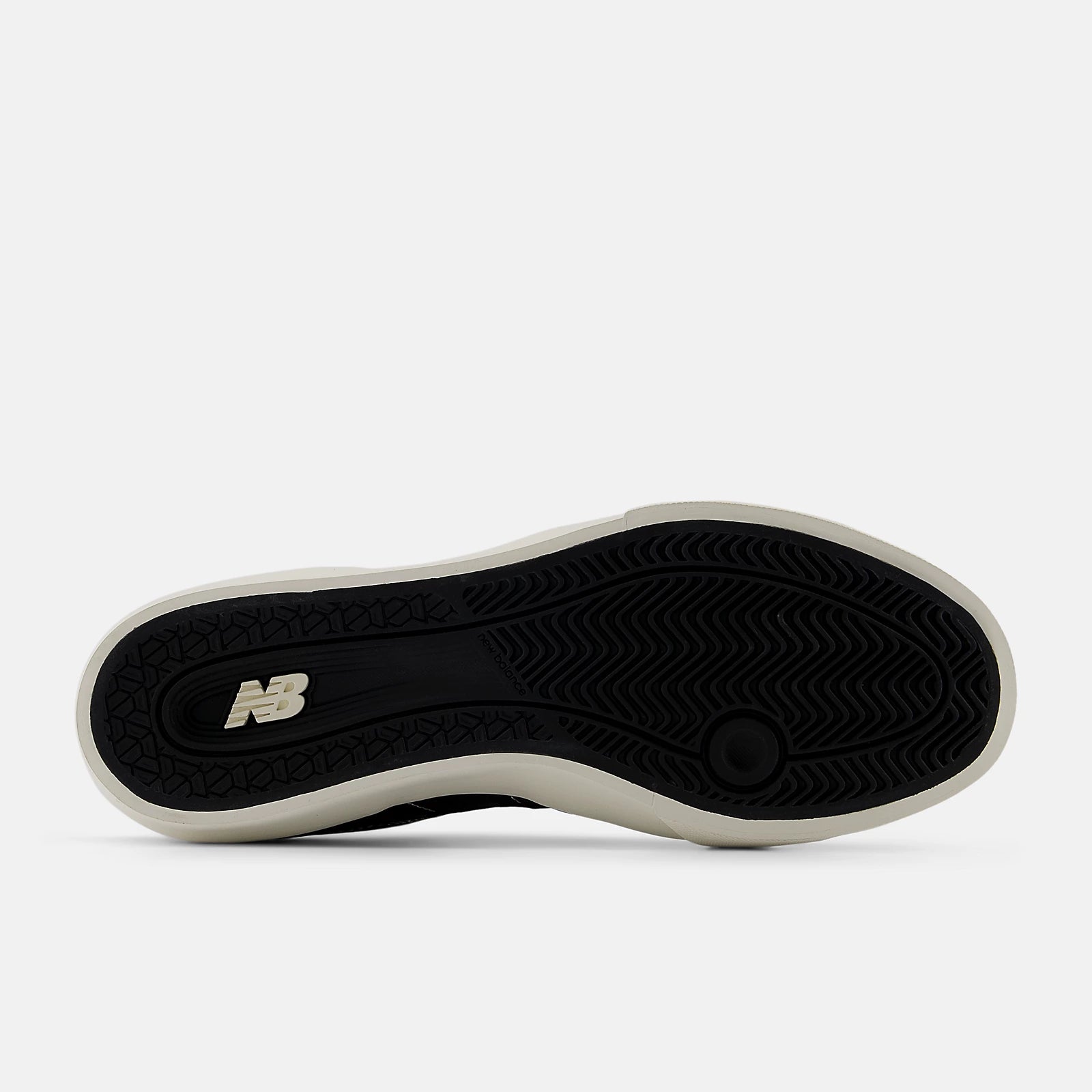 Black sole of a shoe with New Balance logo on a white background