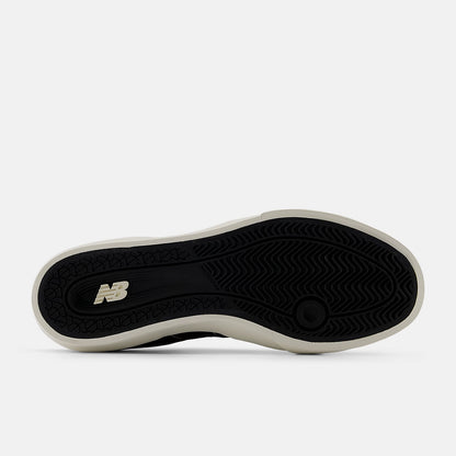 Black sole of a shoe with New Balance logo on a white background